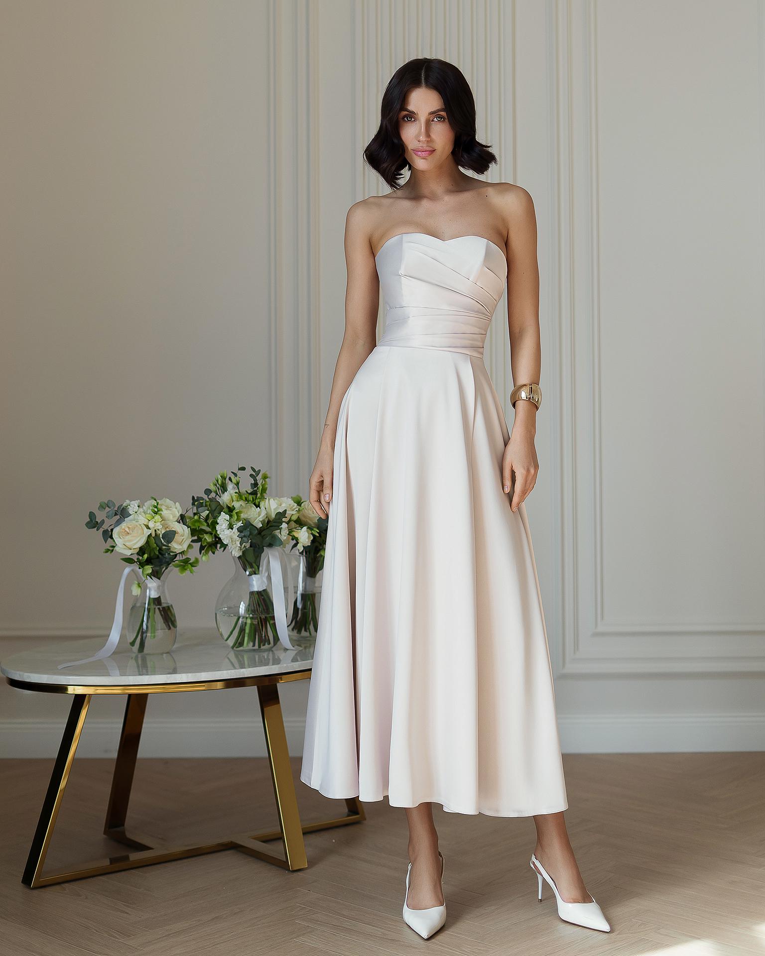 Elegant Ivory Strapless A-Line Midi Dress with Pleated Bodice