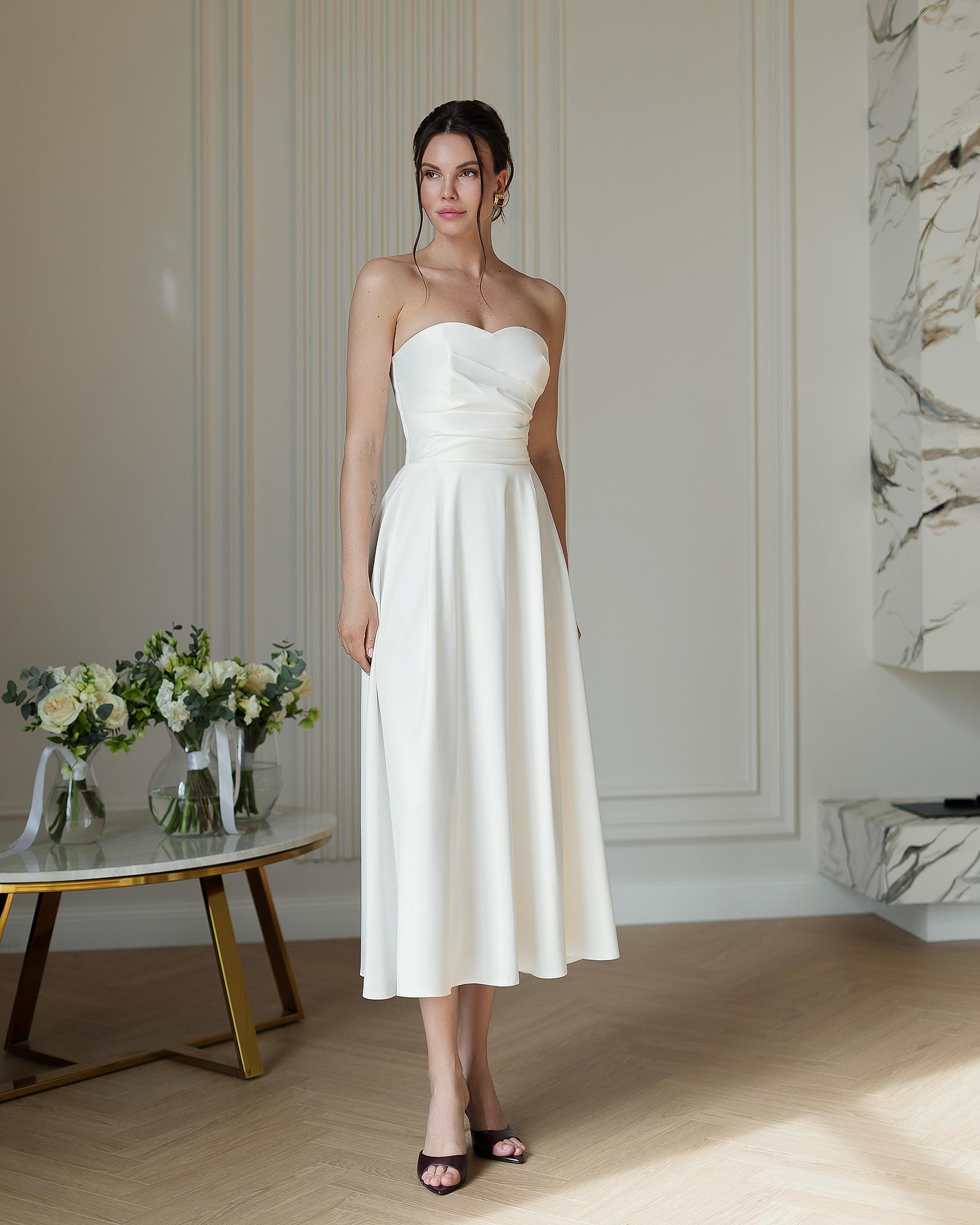 Elegant Ivory Strapless A-Line Midi Dress with Pleated Bodice